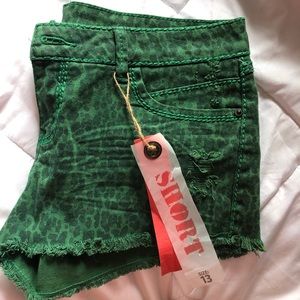 Green cheetah print shorts